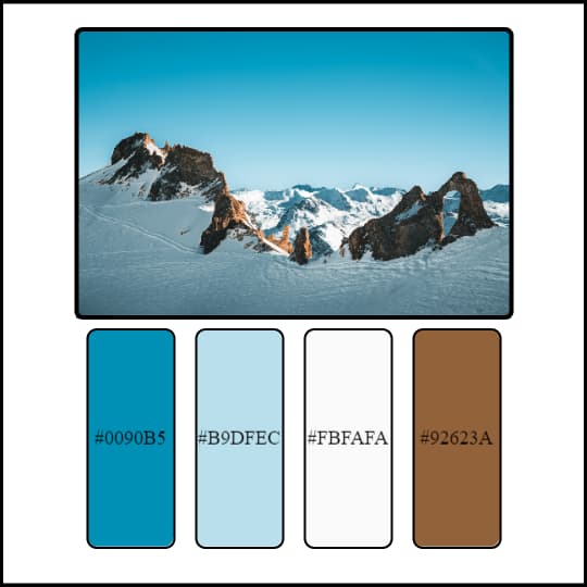 A palette of colors with mountains in the background